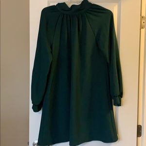 Green cocktail dress with Bow neck.